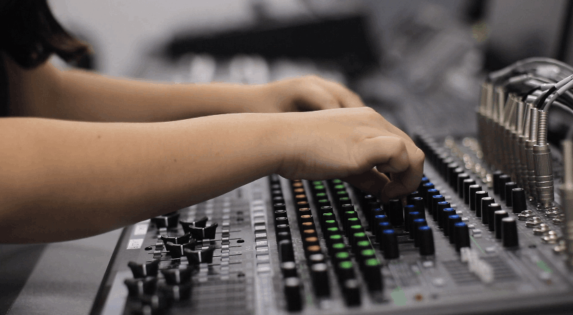 Student at the sound board