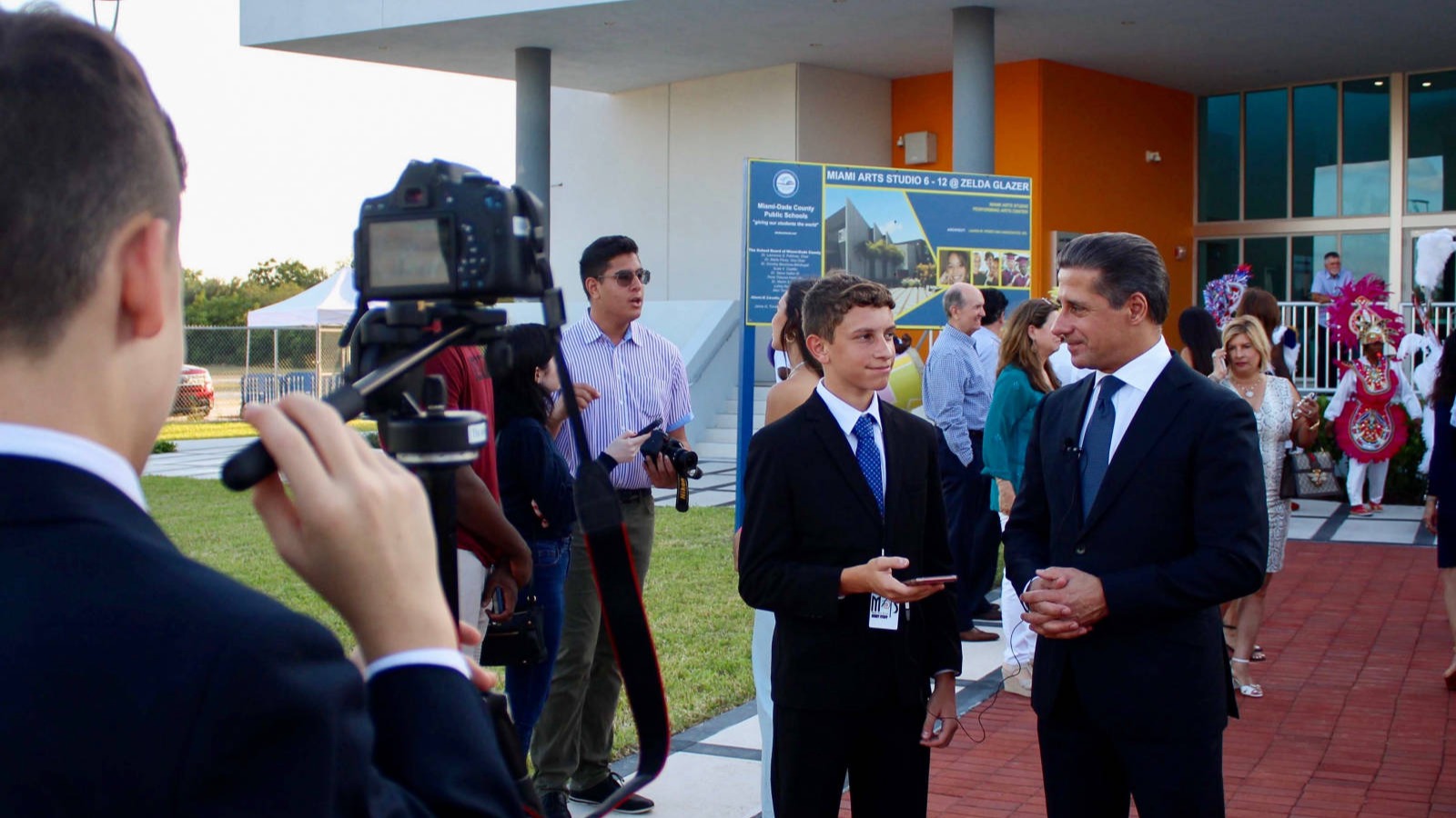 Students interviewing Superintendent